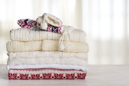 5fd9d247b3feac283cb662c1_winter-clothes-folded-retail